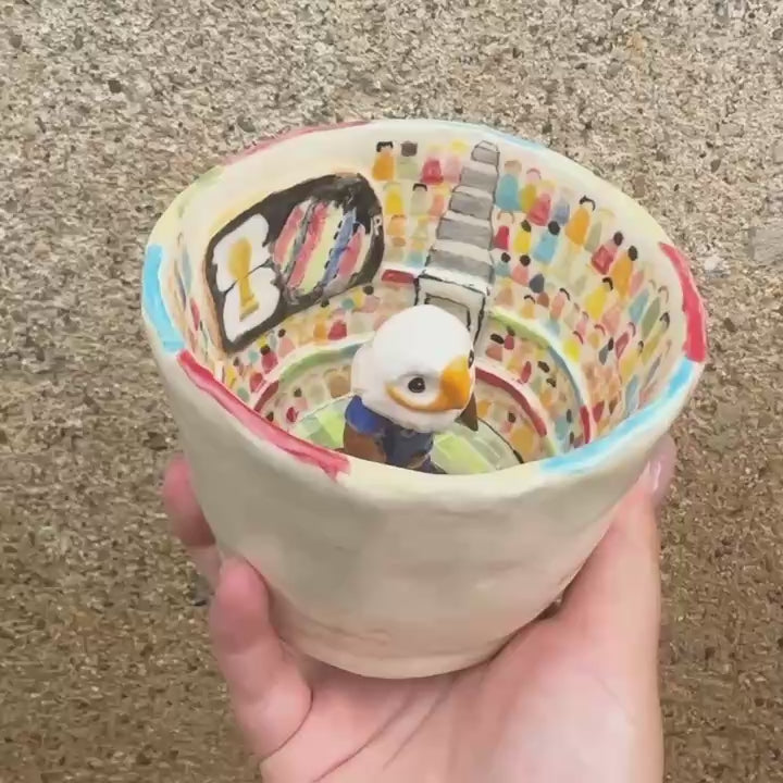 Handcrafted Ceramic Mug from the 2026 World Cup Mascot Series featuring Clutch the Eagle USA Edition with a vibrant hand-painted miniature stadium interior and artisan glaze | kiln solo